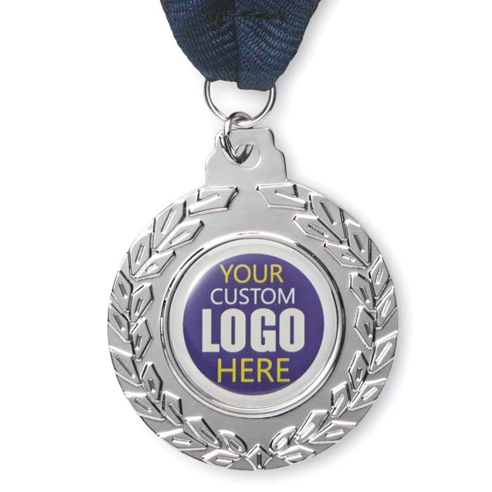 Médaille en fer de 50 mm avec doming. 1 couleur/2 faces sur ruban.